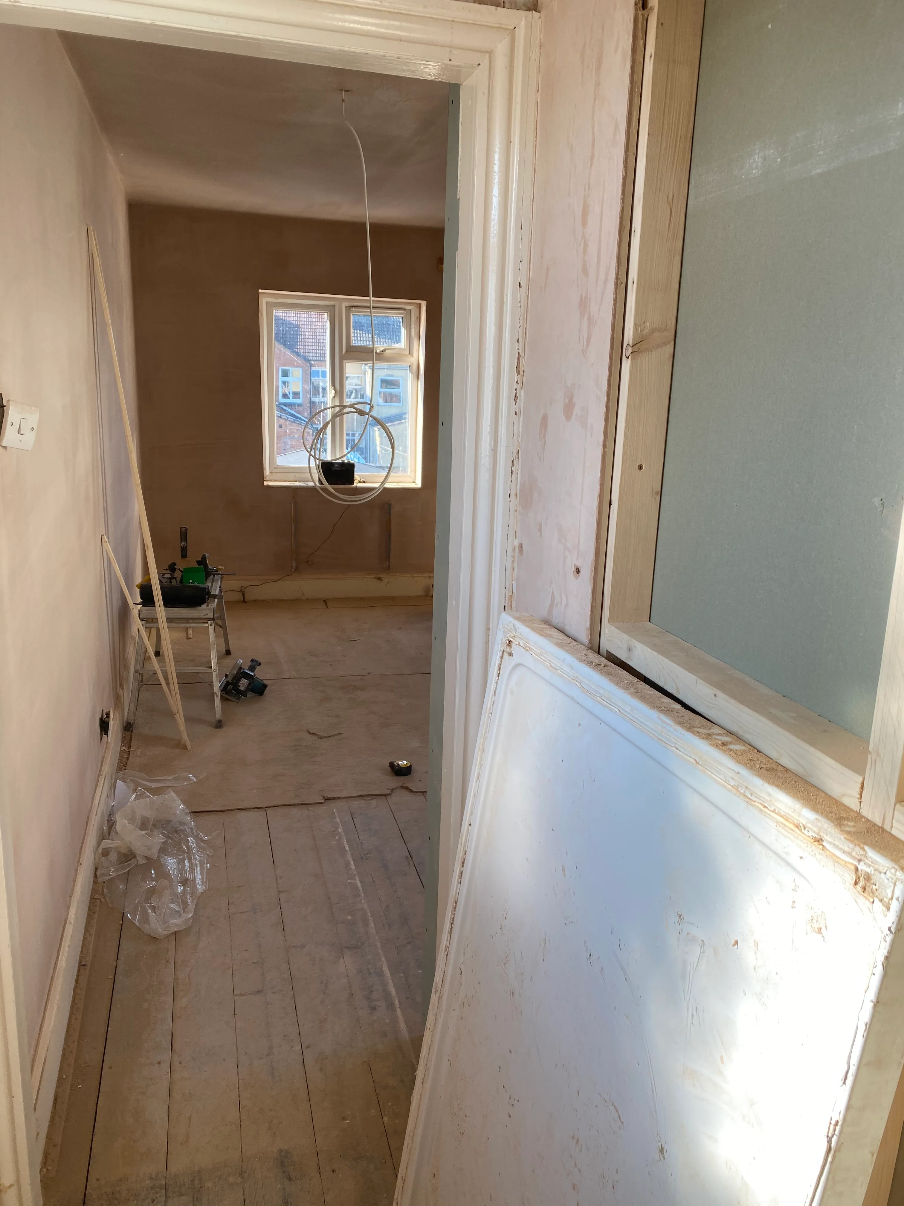 HMO conversion room before finishing works with exposed cabling
