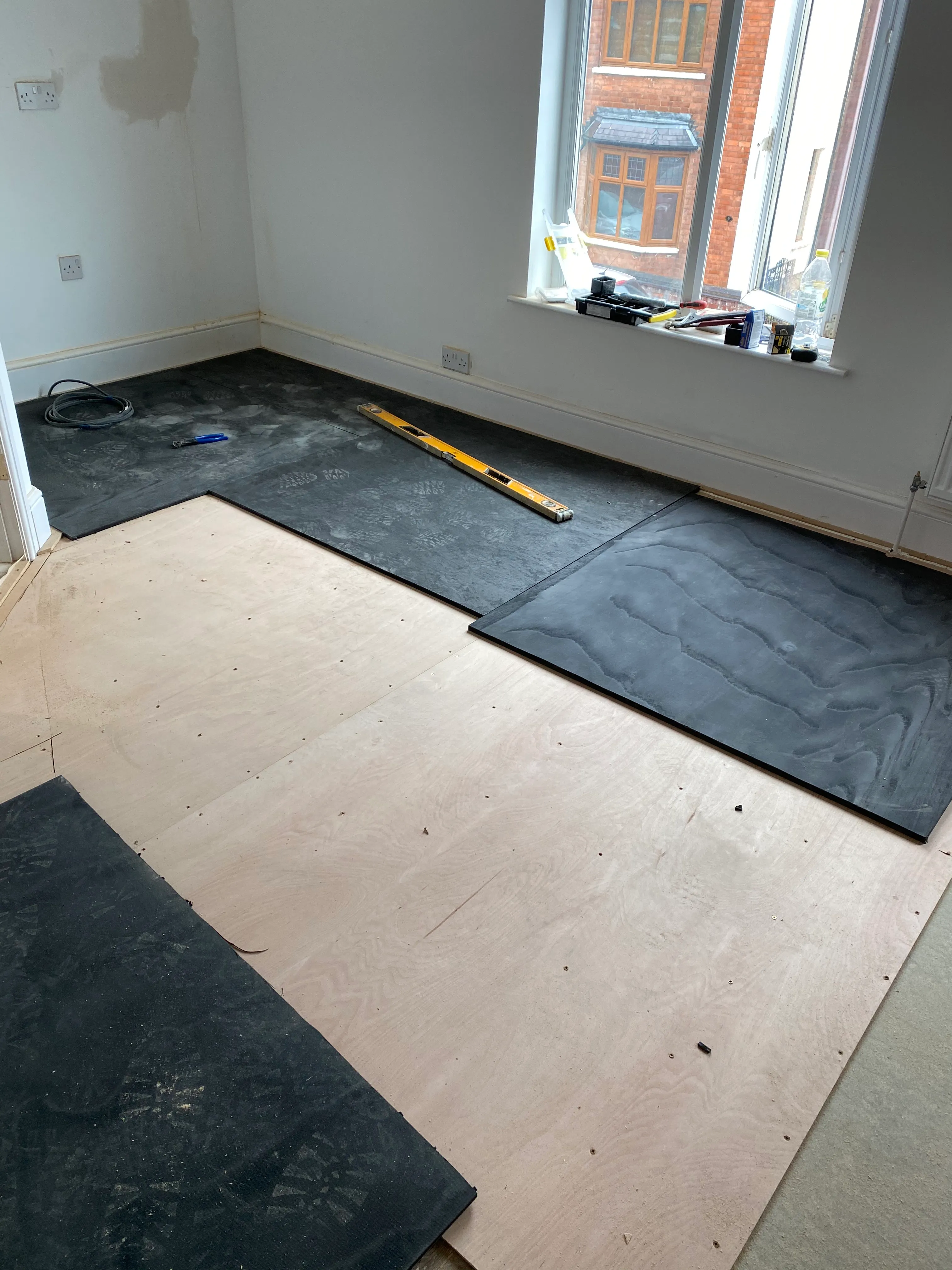 HMO conversion room during flooring installation