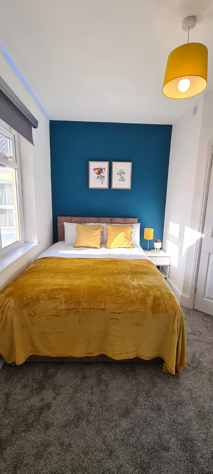 Finished HMO bedroom with carpet, bed and furnished interior