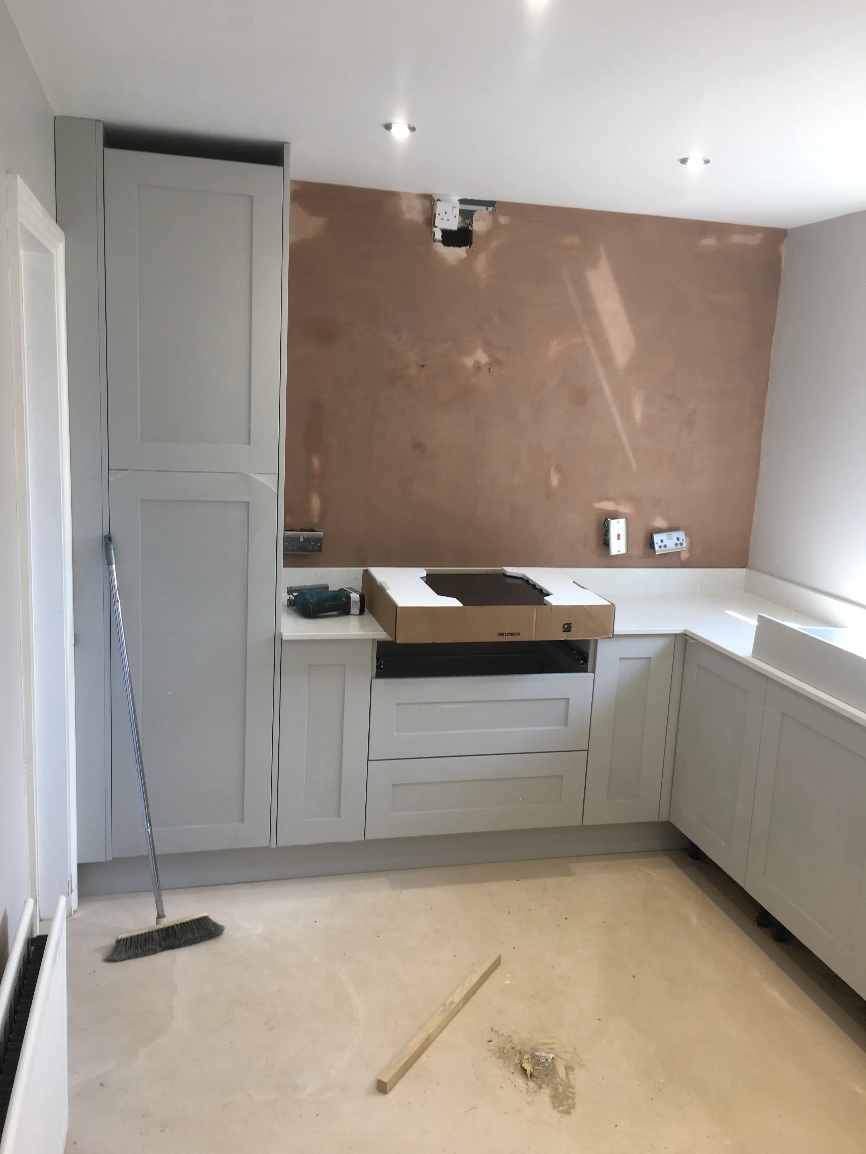Before refurbishment at White Worktop Rental Kitchen